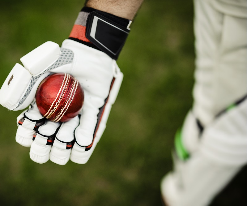 Cricket player getting ready to play